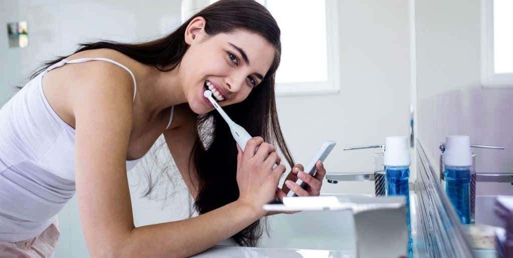 How to brush your teeth with a sonic toothbrush