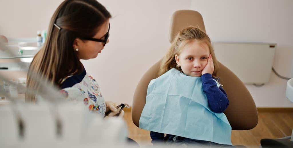 Filling a deciduous tooth in the UK