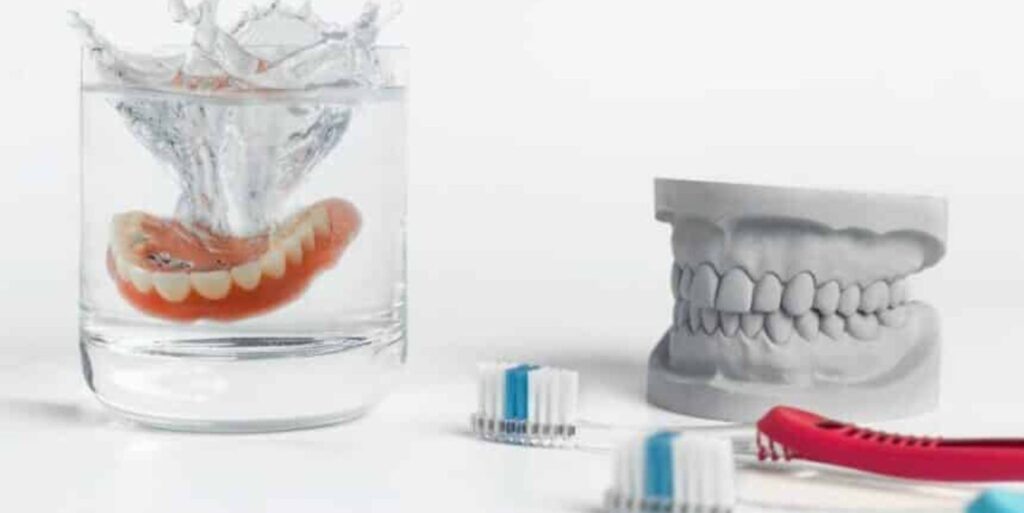 What do I clean my dentures with?